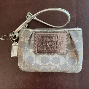 Brand new silver coach wristlet